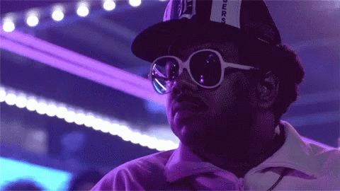 A Man Wearing Sunglasses And A Hat That Says ' Supreme ' On It GIF
