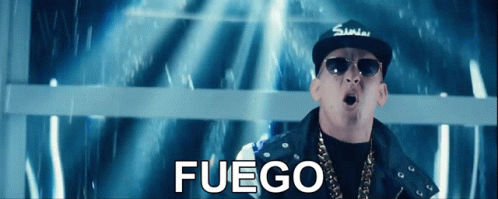 A Man Wearing Sunglasses And A Hat With The Word Fuego Written On It GIF