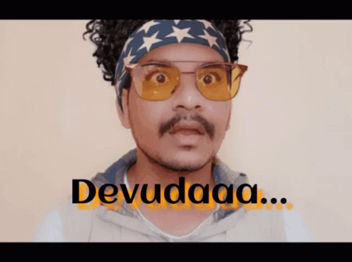 A Man Wearing Sunglasses And A Headband Says Devudaa GIF