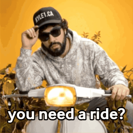 A Man Wearing Sunglasses And A Kyle1.ca Hat Rides A Scooter GIF