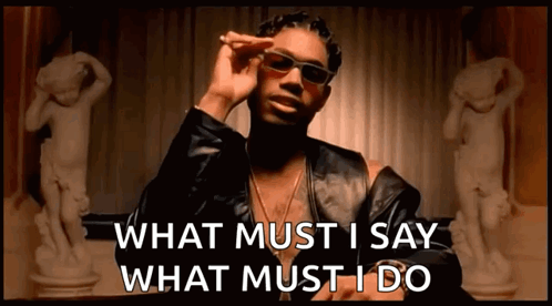 A Man Wearing Sunglasses And A Leather Jacket Says What Must I Say What Must I Do GIF