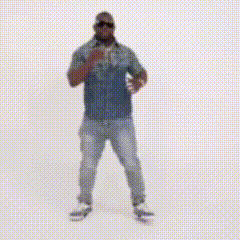 A Man Wearing Sunglasses And A Necklace Is Dancing . GIF