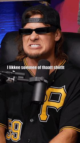A Man Wearing Sunglasses And A Pittsburgh Pirates Jersey GIF