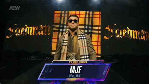A Man Wearing Sunglasses And A Plaid Scarf With The Name Mjf GIF