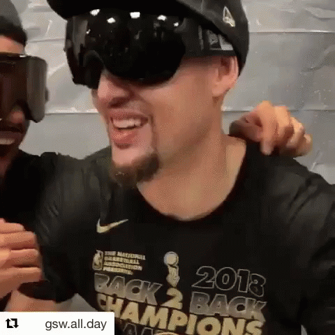 A Man Wearing Sunglasses And A Shirt That Says 2013 Back 2 Back Champions GIF