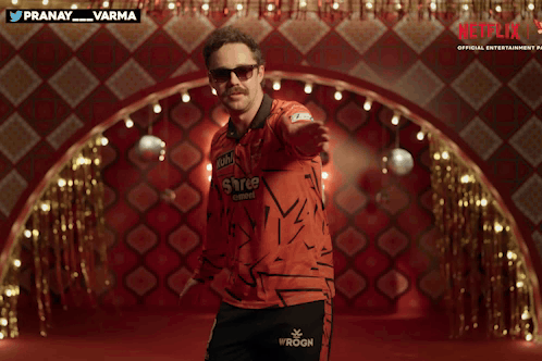 A Man Wearing Sunglasses And A Shirt That Says Iroon On It GIF
