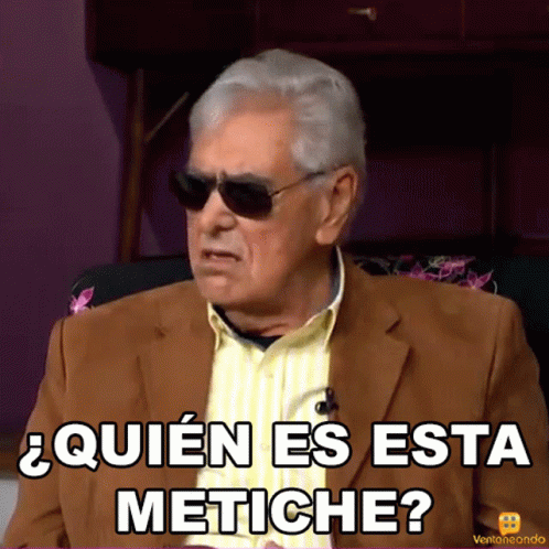 A Man Wearing Sunglasses And A Suit Says " Quien Es Esta Metiche " GIF