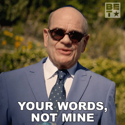 A Man Wearing Sunglasses And A Suit Says Your Words Not Mine GIF
