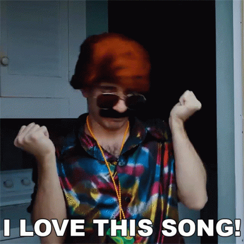 A Man Wearing Sunglasses And A Wig Says " I Love This Song " GIF