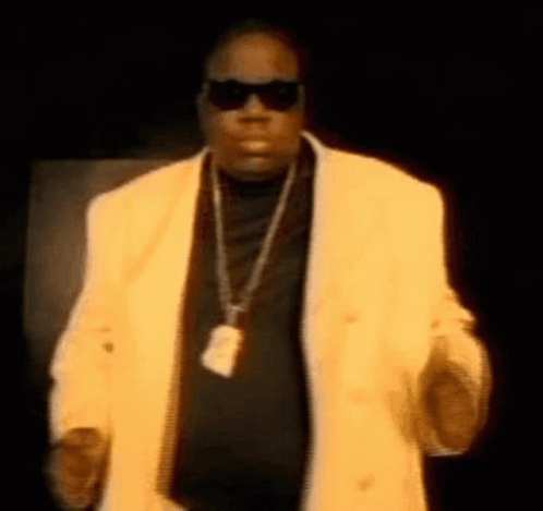 Man In Sunglasses And Yellow Jacket Dancing GIF