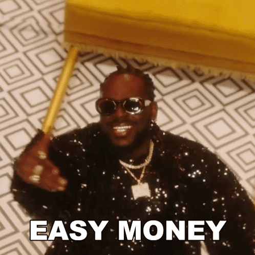 A Man Wearing Sunglasses And Sequins Is Smiling And Holding A Cane With Easy Money Written On It GIF