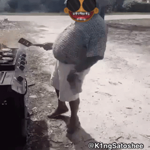 A Man Wearing Sunglasses Is Cooking Food On A Grill With The Hashtag K1ngsatoshee At The Bottom GIF
