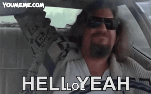 A Man Wearing Sunglasses Is Driving A Car And Says Hell Yeah GIF