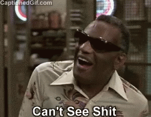 A Man Wearing Sunglasses Is Laughing And Saying `` Can 'T See Shit '' GIF