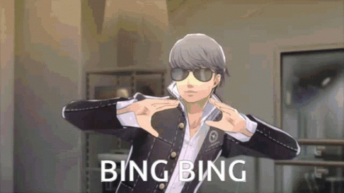 A Man Wearing Sunglasses Is Making A Hand Gesture With The Words Bing Bing Below Him GIF