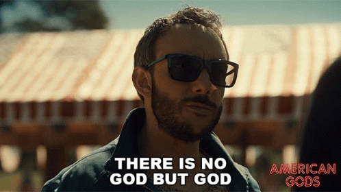 A Man Wearing Sunglasses Is Saying There Is No God But God GIF