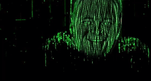 A Man Wearing Sunglasses Is Surrounded By Green Matrix Code And Is Smiling . GIF