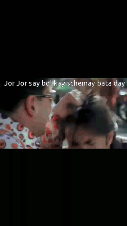 A Man Wearing Sunglasses Is Talking To Another Man GIF