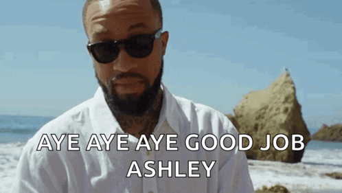 A Man Wearing Sunglasses Says Aye Aye Aye Good Job Ashley On The Beach GIF