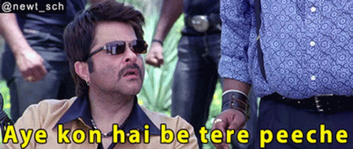 A Man Wearing Sunglasses Says Aye Kon Hai Be Tere Peache GIF