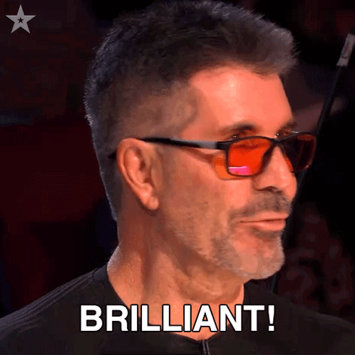 A Man Wearing Sunglasses Says " Brilliant " In Front Of His Face GIF