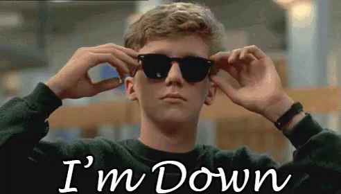 A Man Wearing Sunglasses Says I 'M Down In The Corner GIF