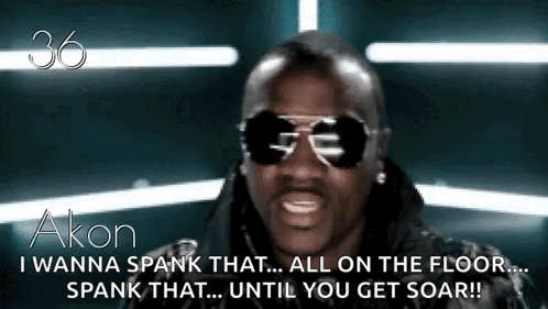 A Man Wearing Sunglasses Says " I Wanna Spank That All On The Floor Spank That ... Until You Get Soar !! " GIF