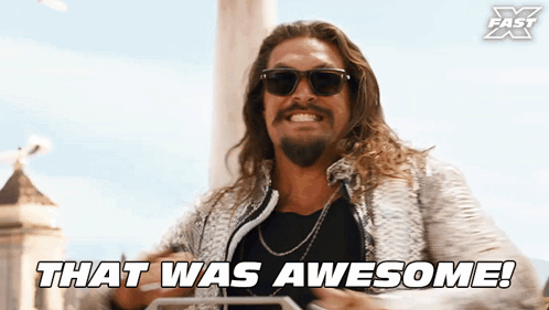 A Man Wearing Sunglasses Says That Was Awesome On The Screen GIF