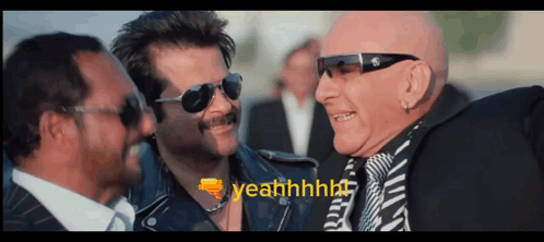 A Man Wearing Sunglasses Says " Yeahhhhh " While Talking To Two Other Men GIF