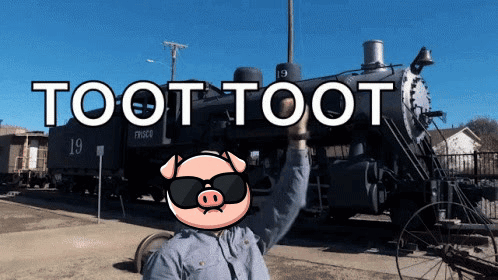 A Man Wearing Sunglasses Stands In Front Of A Train With The Words Toot Toot Written On It GIF