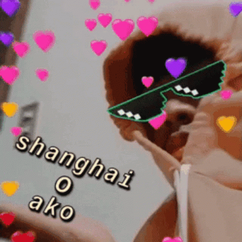 A Man Wearing Sunglasses That Say Shanghai O Ako Is Surrounded By Hearts GIF