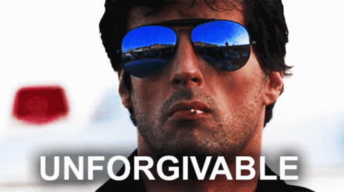 A Man Wearing Sunglasses With The Word Unforgivable Written Below Him GIF