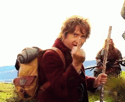 A Man With A Backpack Is Making A Middle Finger Gesture GIF