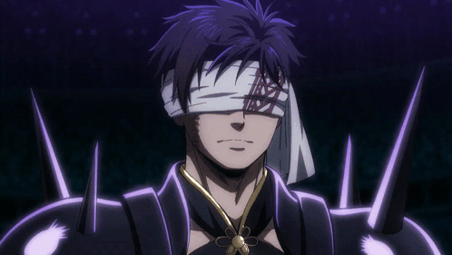 A Man With A Bandage On His Eyes Is Smiling In A Dark Room GIF
