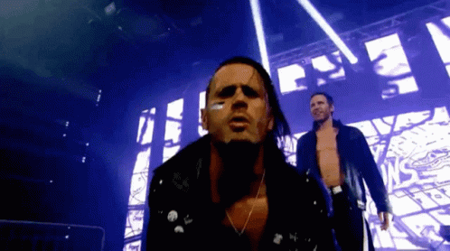 A Man With A Bandage On His Face Is Standing Next To Another Man With A Bandage On His Face GIF