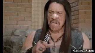 A Man With A Bandage On His Nose Is Holding A Snickers Bar In His Hand . GIF