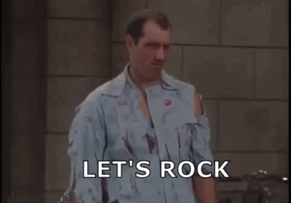Man With Bandaged Arm In Front Of Brick Wall GIF