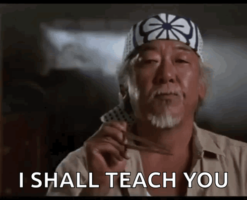 A Man With A Bandana On His Head Is Holding A Pair Of Scissors And Says I Shall Teach You GIF