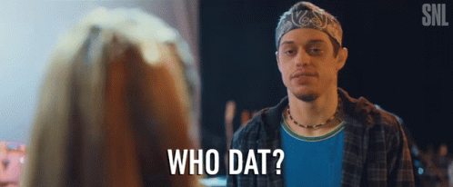 A Man With A Bandana On His Head Is Talking To A Woman And Says Who Dat GIF