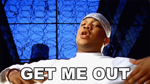 A Man With A Bandana On His Head Says " Get Me Out " GIF