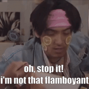 A Man With A Bandana On His Head Says " Oh Stop It I 'M Not That Flamboyant " GIF
