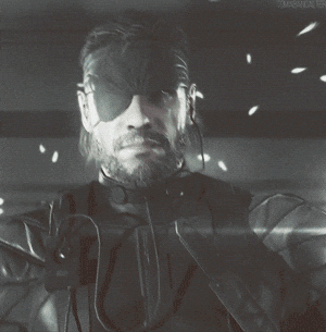 A Man With A Beard And A Bandana On His Eye GIF