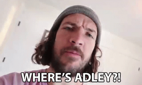 A Man With A Beard And A Beanie Is Looking At The Camera And Says `` Where 'S Adley '' . GIF
