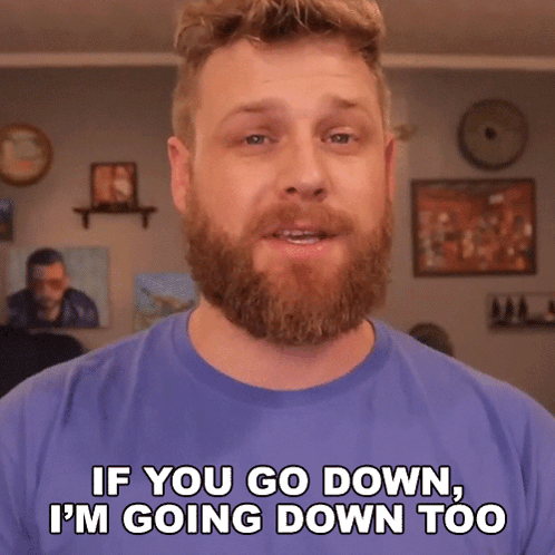 A Man With A Beard And A Blue Shirt Is Saying If You Go Down I 'M Going Down Too GIF
