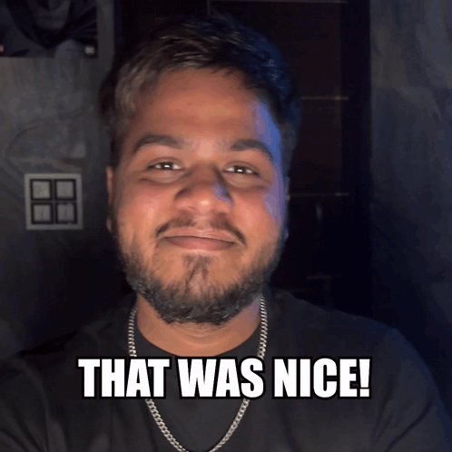 A Man With A Beard And A Chain Around His Neck Says " That Was Nice " GIF
