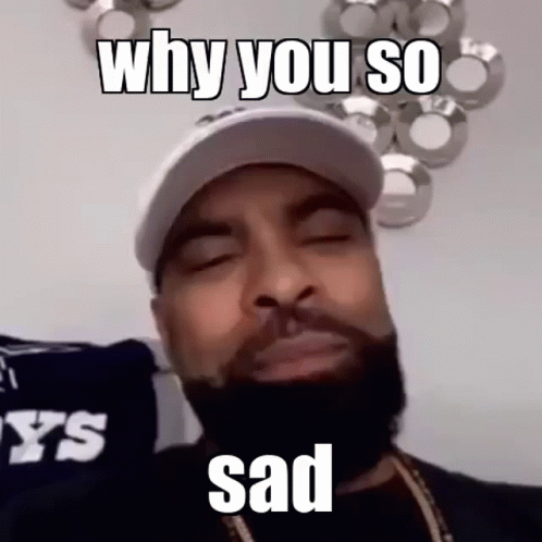 A Man With A Beard And A Hat Is Making A Sad Face And Says `` Why You So Sad '' . GIF