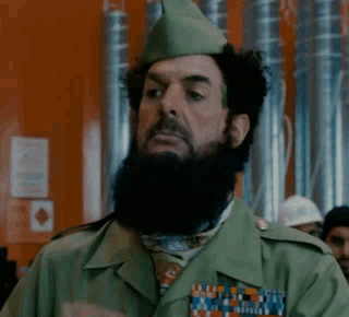 Man With Beard And Hat In Green Uniform GIF