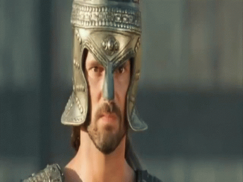A Man With A Beard And A Helmet On His Head GIF
