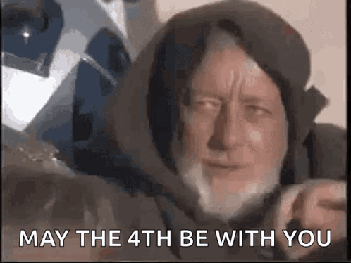 A Man With A Beard And A Hood Is Saying `` May The Fourth Be With You '' . GIF