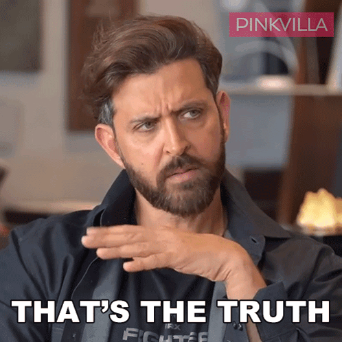 A Man With A Beard And A Pinkvilla Logo Behind Him GIF